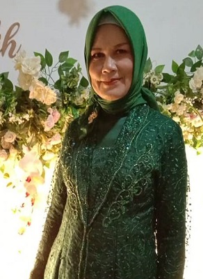 Dra. Siti Aminah